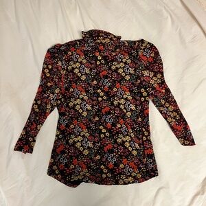 T Tahari Mesh Turtleneck top.